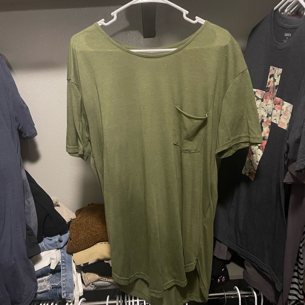 Large Olive green hemmed shirt.